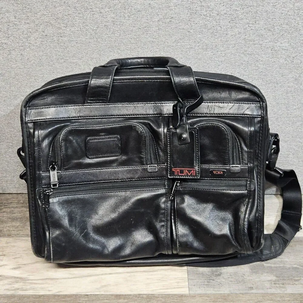 TUMI Black Leather Expandable Laptop Briefcase